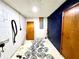 Utility basement with painted walls, a decorated floor, and access doors at 1145 Se 32Nd Ave, Ocala, FL 34471