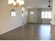 Bright living room with wood-look floors and ample natural light at 11536 Sw 138Th Ln, Dunnellon, FL 34432
