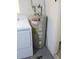 A.O. Smith water heater next to a washing machine and dryer at 11536 Sw 138Th Ln, Dunnellon, FL 34432
