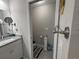 Bathroom featuring a toilet room, vanity with granite countertop, and decorative accessories at 13356 Sw 66Th St, Ocala, FL 34481