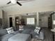 Spacious living room area featuring a comfortable sectional couch with natural light coming through at 13356 Sw 66Th St, Ocala, FL 34481