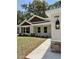 Close up of the home's exterior and landscaping with clearly visible house number at 13506 Sw 114Th Ln, Dunnellon, FL 34432