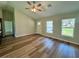 Open-concept living room with vaulted ceilings and natural light at 13506 Sw 114Th Ln, Dunnellon, FL 34432