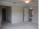Bright bedroom with neutral walls, carpet flooring, and ample closet space creates a cozy retreat at 13675 Sw 111Th Ave, Dunnellon, FL 34432