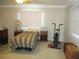 Bright bedroom includes two windows and side tables at 13675 Sw 111Th Ave, Dunnellon, FL 34432