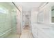 Modern bathroom featuring a glass shower and double vanity sinks with plenty of counter space at 14085 Sw 34Th Terrace Rd, Ocala, FL 34473