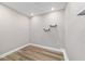 Walk-in closet with wood-look floors, recessed lighting and space for customized organization at 14085 Sw 34Th Terrace Rd, Ocala, FL 34473
