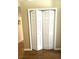 Convenient bi-fold closet doors, providing ample storage space and easy access at 19059 Sw 92Nd Loop, Dunnellon, FL 34432