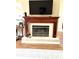 Classic fireplace with a decorative mantel, adding warmth and charm to the living space at 19059 Sw 92Nd Loop, Dunnellon, FL 34432