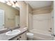 Well-maintained bathroom with a bathtub, vanity, and ample space for personal care routines at 2693 Craven Way, The Villages, FL 32162