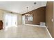 Open dining area with tile floors and views to the outside at 2693 Craven Way, The Villages, FL 32162