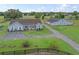 Expansive property featuring a charming home and separate building on lush green acreage at 2780 Ne 127Th Pl, Anthony, FL 32617