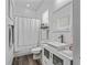 Modern bathroom with a sleek vanity, contemporary fixtures, and a clean, bright ambiance at 2780 Ne 127Th Pl, Anthony, FL 32617