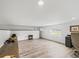 Spacious bonus room featuring luxury vinyl plank flooring and ample natural light at 2780 Ne 127Th Pl, Anthony, FL 32617