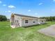 Beautiful home with an inviting exterior, well-maintained landscaping, and a serene atmosphere at 2780 Ne 127Th Pl, Anthony, FL 32617