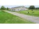 Beautiful home with a well-maintained lawn, charming landscaping, and a tranquil setting at 2780 Ne 127Th Pl, Anthony, FL 32617