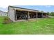 Large garage with plenty of space for vehicles and storage at 2780 Ne 127Th Pl, Anthony, FL 32617