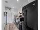 Efficient laundry room with modern washer, dryer, and sink at 2780 Ne 127Th Pl, Anthony, FL 32617