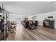 Spacious living room featuring comfortable seating, stylish decor, and abundant natural light at 2780 Ne 127Th Pl, Anthony, FL 32617