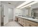 Bright bathroom with dual sinks, large mirror, and plenty of counter space and storage at 3230 Se 45Th St, Ocala, FL 34480