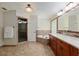 Well-appointed bathroom with walk-in shower, soaking tub, and double vanity for a spa-like experience at 3230 Se 45Th St, Ocala, FL 34480