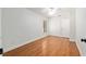 Cozy bedroom with bright lighting, hardwood floors, and a ceiling fan to help with climate control at 3230 Se 45Th St, Ocala, FL 34480