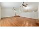 Spacious living room with hardwood floors and ceiling fans at 3230 Se 45Th St, Ocala, FL 34480