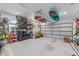 Spacious two-car garage featuring ample storage and organization options at 3810 Sw 5Th Ave, Ocala, FL 34471