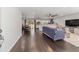 Open-concept living room features hardwood floors, neutral walls, and seamless flow to the dining and kitchen areas at 3810 Sw 5Th Ave, Ocala, FL 34471