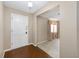 Warm and inviting front entrance featuring wood and carpeted floors at 3834 Se 9Th Pl, Ocala, FL 34471