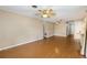 Spacious living area with wood floors and easy access to the kitchen at 3834 Se 9Th Pl, Ocala, FL 34471