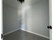This walk-in closet has tiled floors, white walls, and a dark doorknob at 4424 Sw Carnation Ct, Dunnellon, FL 34431