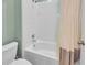 Bathroom featuring a bathtub and shower combination at 5198 Ne 19Th Pl, Ocala, FL 34470