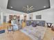 Open concept living room with neutral décor, recessed lighting, tile floors, and ceiling fan at 5198 Ne 19Th Pl, Ocala, FL 34470