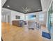 A spacious living room featuring recessed lighting, a ceiling fan, and neutral decor at 5198 Ne 19Th Pl, Ocala, FL 34470