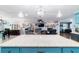 Open kitchen with granite counters and view to dining and living rooms at 5220 Sw 161St Place Rd, Ocala, FL 34473