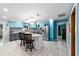 Stylish kitchen with an island, stainless steel appliances, and beautiful blue cabinetry at 5220 Sw 161St Place Rd, Ocala, FL 34473