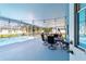 Relaxing screened patio with a dining area, a pool, and outdoor lights at 5220 Sw 161St Place Rd, Ocala, FL 34473