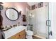 Modern bathroom featuring vanity, shower, and unique decor at 5484 Sw 30Th Ave, Ocala, FL 34471