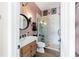 Modern bathroom featuring vanity, shower, and unique decor at 5484 Sw 30Th Ave, Ocala, FL 34471