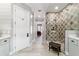 Hallway featuring shiplap and a decorative mosaic tiled shower at 5484 Sw 30Th Ave, Ocala, FL 34471