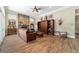 Relaxing living room boasting stone fireplace, hardwood floors, and stylish decor at 5484 Sw 30Th Ave, Ocala, FL 34471