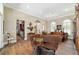 Open concept living room that features hardwood floors, neutral paint colors, and an open floor plan at 5484 Sw 30Th Ave, Ocala, FL 34471