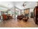 Inviting living room with fireplace, adjacent dining area, and ample natural light at 5484 Sw 30Th Ave, Ocala, FL 34471