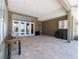 Covered patio with brick flooring with outdoor grill, cabinets and view of the pool at 5484 Sw 30Th Ave, Ocala, FL 34471