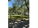 Two-story condo building with well-maintained lawn and landscaping in a quiet location at 571 Midway Trak # J202, Ocala, FL 34472