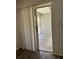 Enclosed patio with sliding glass door access from living room at 571 Midway Trak # J202, Ocala, FL 34472