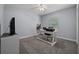 Bedroom featuring a desk and neutral-toned walls at 5899 Pecan Rd, Ocala, FL 34472