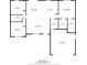 Detailed floor plan showcasing the layout of the 1390 sq ft home, including bedrooms, living areas, and garage at 5899 Pecan Rd, Ocala, FL 34472