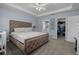 Large main bedroom with walk-in closet, carpeted floor, and neutral walls at 5899 Pecan Rd, Ocala, FL 34472